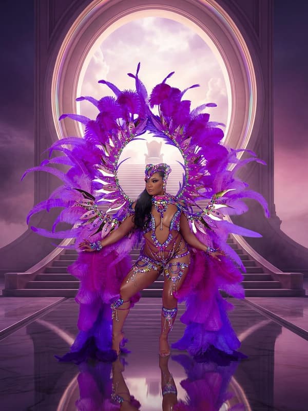 Halo costume: a model in a violet feathered costume and large halo backpiece